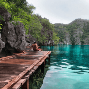 A tourist enjoying the panoramic view of Barracuda Lake, one of Coron’s premiere island destinations