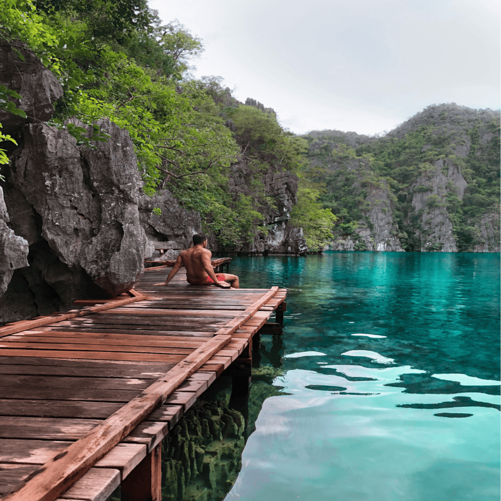 A tourist enjoying the panoramic view of Barracuda Lake, one of Coron’s premiere island destinations